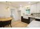 Bright and airy kitchen with a farmhouse sink, and a breakfast nook at 9519 Feldbank Dr, Charlotte, NC 28216