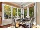 Breakfast nook with table and chairs, overlooking backyard at 8903 Hillstone Ct, Sherrills Ford, NC 28673