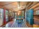 Bright dining room featuring wood walls and a piano at 1141 Bate Harvey Rd, Clover, SC 29710