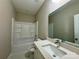 Modern bathroom featuring a shower/tub and vanity at 1712 Mcdonald St, Charlotte, NC 28216
