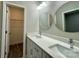 Double vanity bathroom with updated fixtures and large mirrors at 1712 Mcdonald St, Charlotte, NC 28216