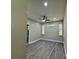 Spacious living room with ceiling fan and hardwood floors at 1712 Mcdonald St, Charlotte, NC 28216