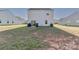 Large backyard with patio, grill and grass at 140 Tanner Loop, Troutman, NC 28166