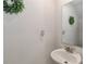 Simple bathroom with single sink vanity and mirror at 140 Tanner Loop, Troutman, NC 28166