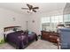 bedroom with bed, dresser, and ceiling fan at 140 Tanner Loop, Troutman, NC 28166
