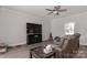 Relaxing Gathering room with a large TV, comfortable seating, and a cozy atmosphere at 140 Tanner Loop, Troutman, NC 28166
