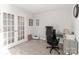 Home office with desk, chair, and ample natural light at 140 Tanner Loop, Troutman, NC 28166