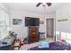 bedroom with large TV, dresser and closet at 140 Tanner Loop, Troutman, NC 28166