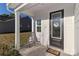 Front porch with rocking chair and view of the neighborhood at 140 Tanner Loop, Troutman, NC 28166