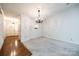 Bright dining room with hardwood floors and chandelier at 806 Bridgewood Dr, Rock Hill, SC 29732
