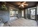 Cozy screened porch with wood flooring and ceiling fan at 806 Bridgewood Dr, Rock Hill, SC 29732