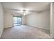 Large bedroom with sliding glass doors leading to a deck at 806 Bridgewood Dr, Rock Hill, SC 29732