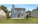 Rear view of a two-story house with a patio at 2773 Round Hill Ct, Rock Hill, SC 29730