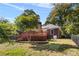 Brick house with a deck and landscaping at 4823 Morris Glen Dr, Concord, NC 28027