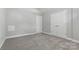 Bedroom with double doors leading to a large closet at 4823 Morris Glen Dr, Concord, NC 28027