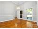 Bright dining room features hardwood floors and a charming chandelier at 4823 Morris Glen Dr, Concord, NC 28027