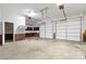 Two-car garage with workshop space and ample storage at 4823 Morris Glen Dr, Concord, NC 28027