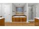 Bathroom boasts a large bathtub, shower, and decorative artwork at 4823 Morris Glen Dr, Concord, NC 28027