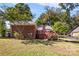 Brick house with a deck and landscaping at 4823 Morris Glen Dr, Concord, NC 28027