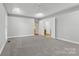 Bright bedroom with access to hallway and another room at 4823 Morris Glen Dr, Concord, NC 28027