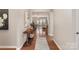 Welcoming entryway with hardwood floors and a view into the living room at 7011 Kitty Hawk Ln, Fort Mill, SC 29707