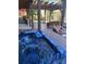 Relaxing hot tub on deck with surrounding seating at 377 Riverwood Rd, Mooresville, NC 28117