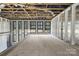Loft area with wall-to-wall windows and modern glass railing at 248 Singleton Rd # 25, Mooresville, NC 28117