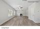 Bright living room featuring hardwood floors, fireplace, and ceiling fan at 209 Lake George Dr, Shelby, NC 28152