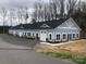 New construction featuring 5 units with garages and brick accents at 12724 Hazelbrook Ln, Cornelius, NC 28031