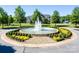 Bailey's Glen community entrance with circular fountain at 12724 Hazelbrook Ln, Cornelius, NC 28031