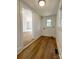 Laundry room with vinyl flooring and window, conveniently located at 112 Maple St, Shelby, NC 28150