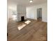 Bright living room with hardwood floors and fireplace at 112 Maple St, Shelby, NC 28150