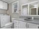 Bathroom with toilet, sink, shower, and laundry hookups at 807 Klondale Ave, Kannapolis, NC 28081