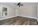 Simple bedroom with hardwood floors and exterior access at 807 Klondale Ave, Kannapolis, NC 28081