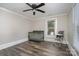 Charming bedroom featuring hardwood floors, a ceiling fan and large window at 807 Klondale Ave, Kannapolis, NC 28081
