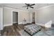Spacious living room with hardwood floors, ceiling fan, and access to other rooms at 807 Klondale Ave, Kannapolis, NC 28081
