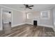 Spacious living room featuring hardwood floors and a fireplace at 807 Klondale Ave, Kannapolis, NC 28081