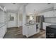 Galley kitchen with white cabinets and stainless steel appliances at 807 Klondale Ave, Kannapolis, NC 28081