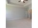 Large bedroom with ceiling fan and carpeted floor at 8723 Acadia Pkwy # 617, Sherrills Ford, NC 28673