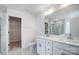 Elegant bathroom with double vanity, marble tile, and walk-in shower at 5234 Verona Rd # 79, Charlotte, NC 28213