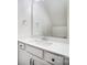 White bathroom vanity with quartz countertop and chrome faucet at 5234 Verona Rd # 79, Charlotte, NC 28213