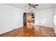 Hardwood floor bedroom with built-in shelving at 2441 Country Club Rd, Lincolnton, NC 28092