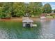 Aerial view of lakefront home with private dock at 459 Kenway Loop, Mooresville, NC 28117
