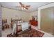 Bedroom with wooden bed frame and neutral color scheme at 459 Kenway Loop, Mooresville, NC 28117