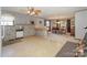 Galley kitchen with light gray cabinets and a breakfast bar at 459 Kenway Loop, Mooresville, NC 28117