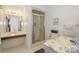 Clean bathroom with shower, vanity, and marbled countertop at 459 Kenway Loop, Mooresville, NC 28117