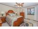 Bedroom with wooden furniture and patterned bedding at 459 Kenway Loop, Mooresville, NC 28117