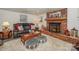 Spacious basement recreation area with fireplace and seating at 459 Kenway Loop, Mooresville, NC 28117