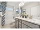 Bathroom with a double vanity and a tub shower combo at 1406 Hubert Graham Way, Tega Cay, SC 29708