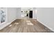 Spacious dining area with hardwood floors and kitchen view at 709 Bringle Ferry Rd, Salisbury, NC 28144